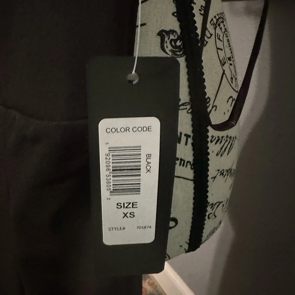 Bebe NWT jumpsuit. Black. Sexy slits up leg. Has stretch. Xs - Picture 2 of 6